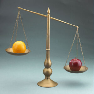 Scale weighing apples and oranges