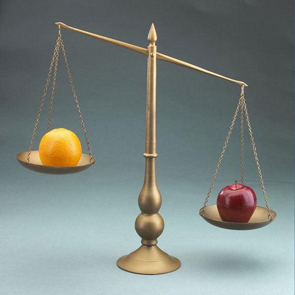 Scale weighing apples and oranges